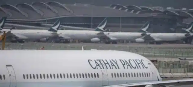 In Hong Kong, an incident involving a Cathay Pacific aeroplane injures 11 people.