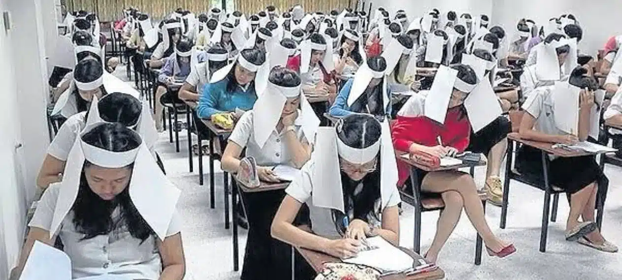 Bangkok University enforces anti-cheating helmets in exams
