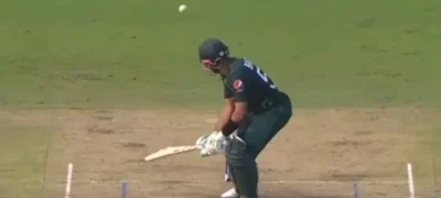 Babar Azam's Innovative Shot Falls Short as He Falls to Siraj's Length Ball