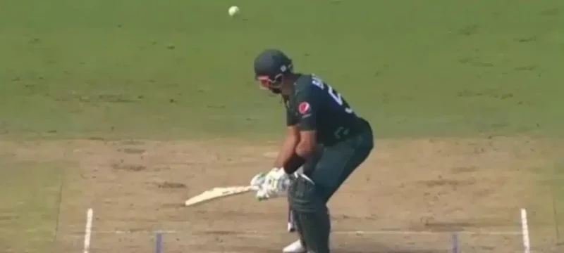 Babar Azam's Innovative Shot Falls Short as He Falls to Siraj's Length Ball