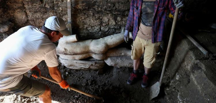 Archaeologists Discover Marble God Statue in Roman Sewer