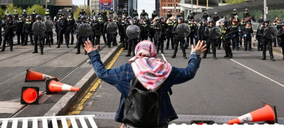 Anti-War Protesters Clash with Police at Melbourne Defense Exibition