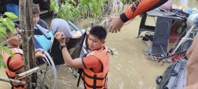 Storm Approaches as Floods in the Philippines Claim 9 Lives and Leave Others Trapped on Roofs