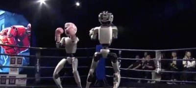 First-Ever Humanoid Robot Fight Stuns the Crowd