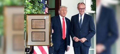 German Chancellor Presents Donald Trump with Grandfather’s Birth Certificate