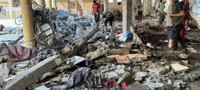 Israeli Airstrikes on Gaza Kill 95, Hit Civilians at Cafe, Schools, and Aid Sites