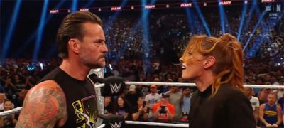 Becky Lynch slaps CM Punk on Raw during a heated segment, shocking fans and setting the stage for an intense WWE storyline.