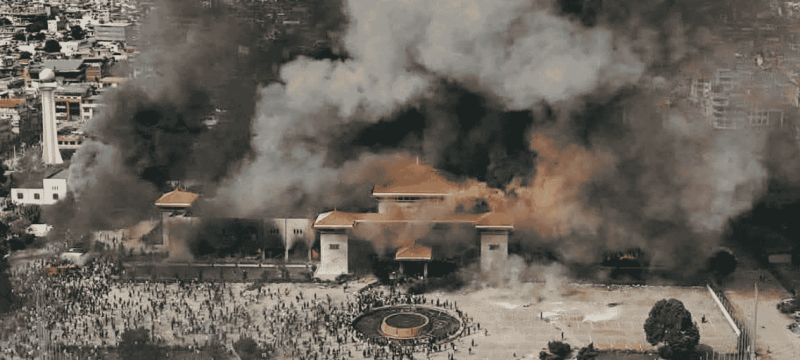 Nepal Protesters Set Fire to Parliament Building