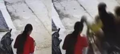 Burqa-Wearing Bike-Riding Thief Snatches Phone in Broad Daylight