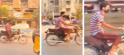 Video: Man Caught Performing 'Indecent Act' While Riding Bike on Busy Karachi Road