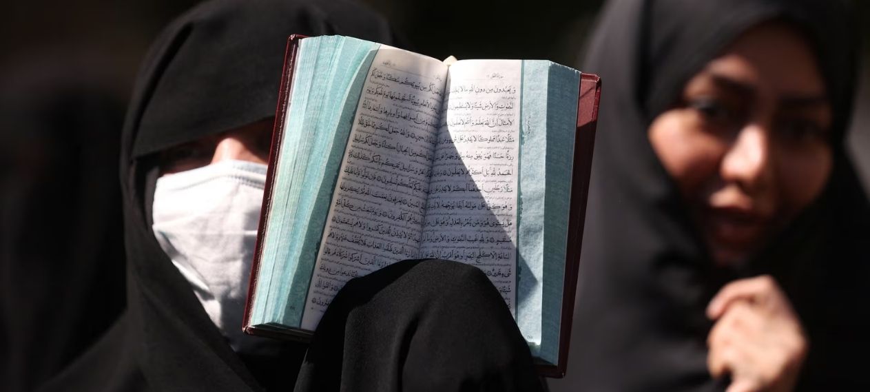 Iranian Women Recite Quran as Strike Explosions Echo Nearby