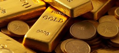 Stronger Dollar Pushes Gold Prices Lower Amid Rising Global Tensions