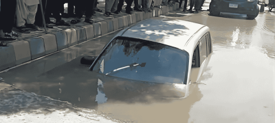 Terrifying Moment: Car With Women Inside Gets Swallowed By Sinkhole On Tariq Road, Karachi