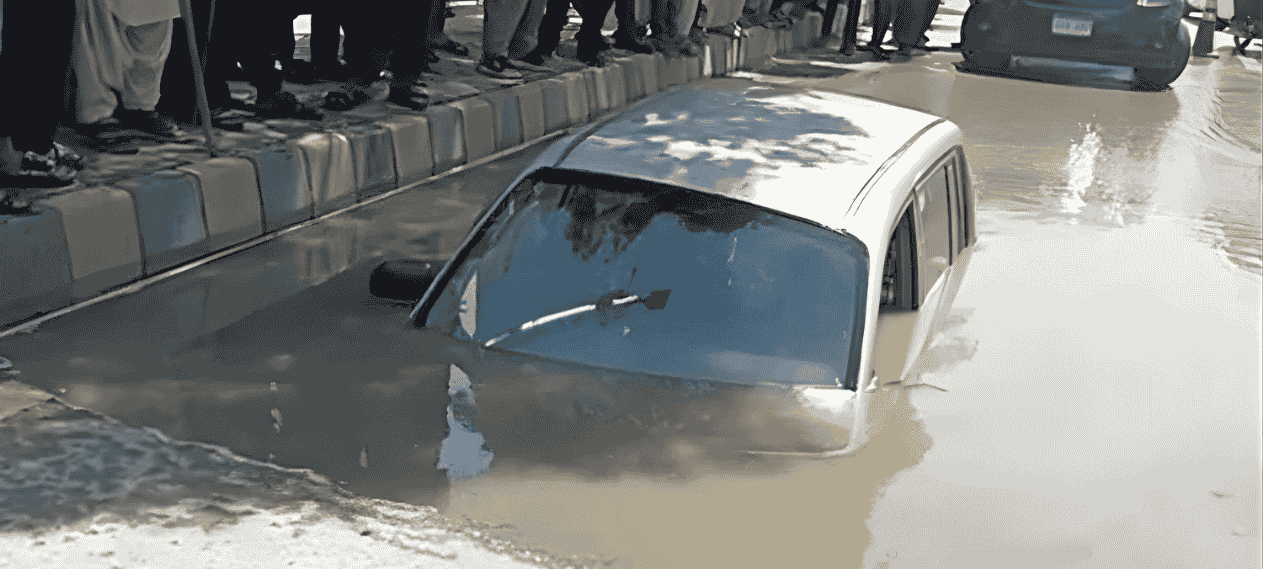 Terrifying Moment: Car With Women Inside Gets Swallowed By Sinkhole On Tariq Road, Karachi