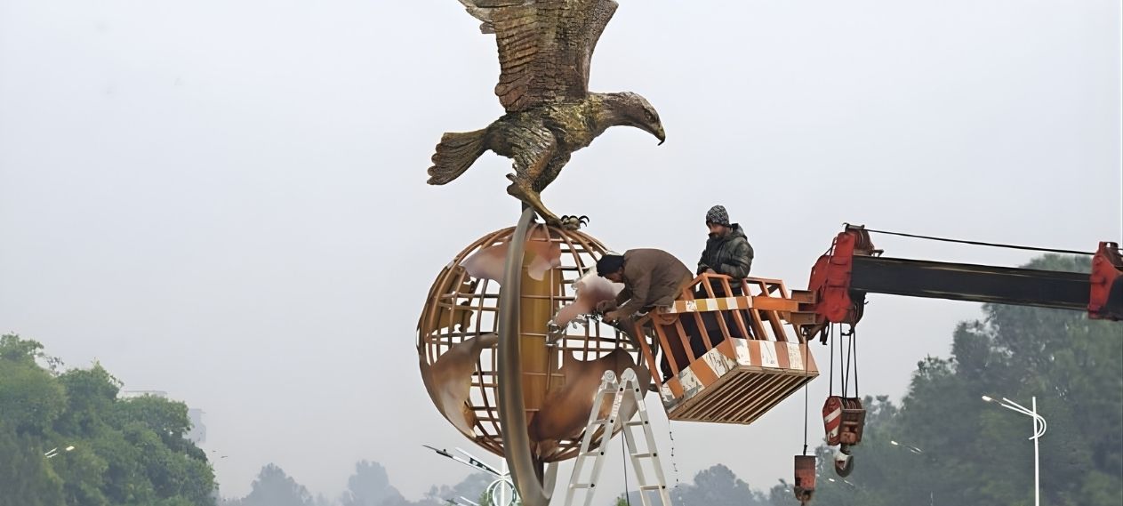 Heavy Rain Damages Eagle Monument at Islamabad’s Shaheen Chowk Underpass