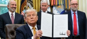 Trump Signs Russia-Iran Sanctions Bill With Up to 100% Tariffs