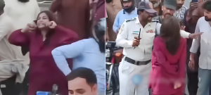 Karachi Woman Blocks Traffic After Car And Rickshaw Collision